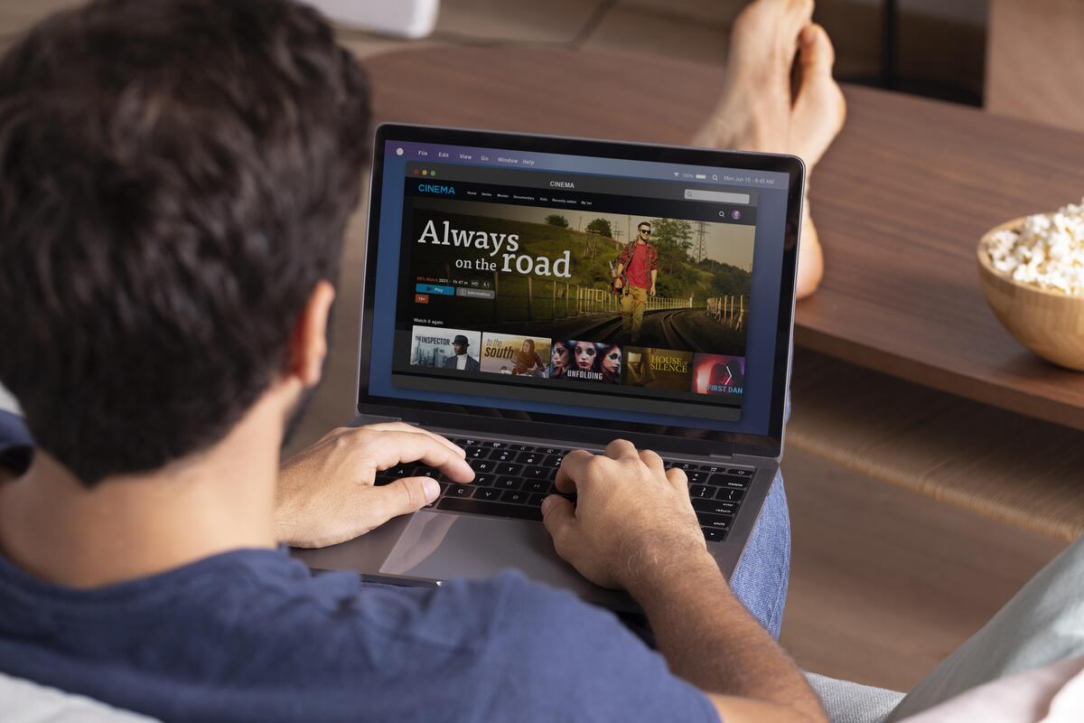 Man watching a streaming service on his laptop